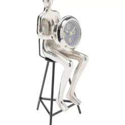 Uhren-KARE Design Tischuhr Sitting Man Silber 12X31Cm